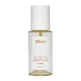 OUAI bottle front view showing St. Barts label and compact travel size benefit