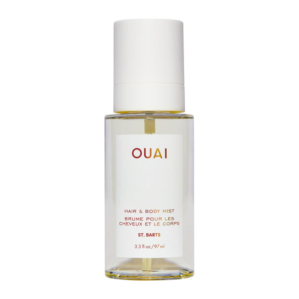 OUAI bottle front view showing St. Barts label and compact travel size benefit