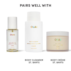 OUAI spraying mist into hair to show gentle application and scent layering