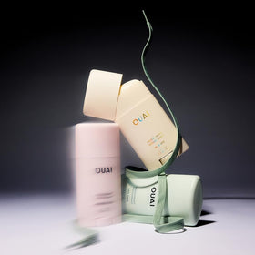 OUAI deodorant open cap top view showcasing secure packaging and easy use benefit