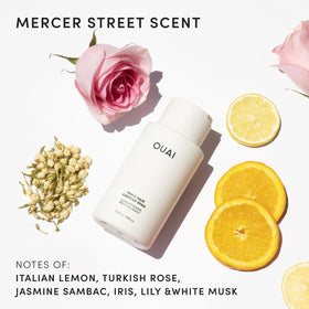 OUAI refill being poured to show easy dispensing and mess-free refill benefit