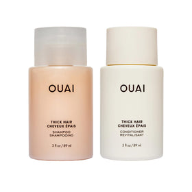 OUAI travel bottles front packaging showing set and travel convenience