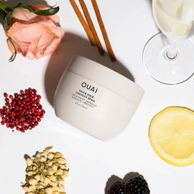 OUAI almond and olive oils with mask highlighting natural moisturizing benefits