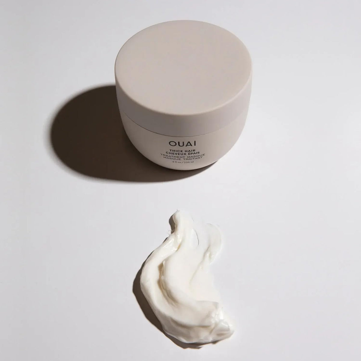 OUAI mask on bathroom shelf in lifestyle setting for effortless routine appeal