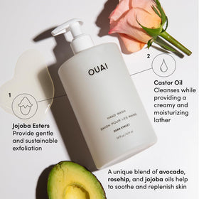 OUAI wash lather on hands showing exfoliating texture and gentle cleanse benefit