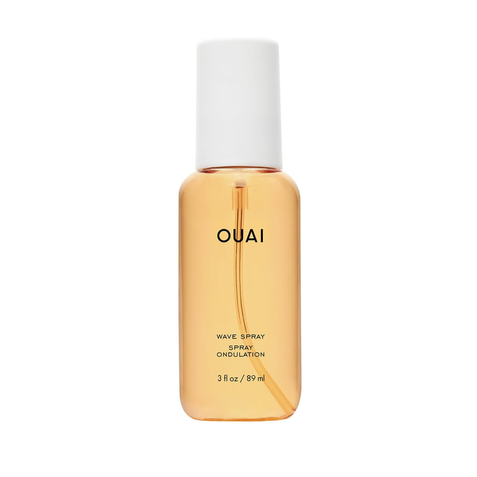 OUAI front bottle view shows compact travel sizing and sleek design benefit