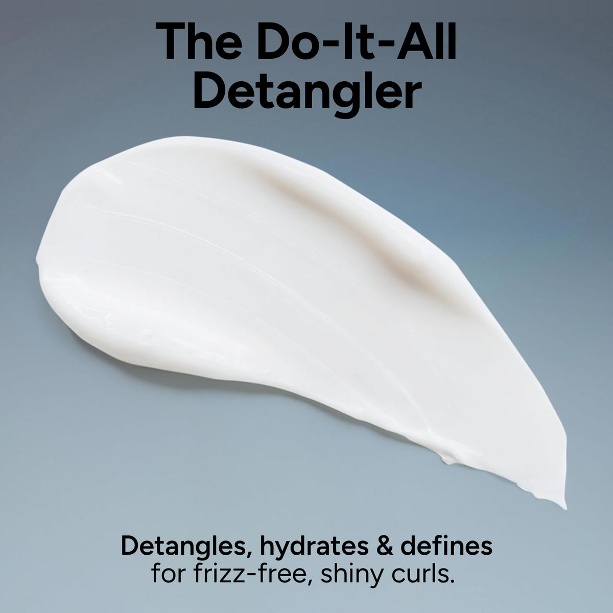Ouidad applied to wet curls illustrating detangling and slip benefit