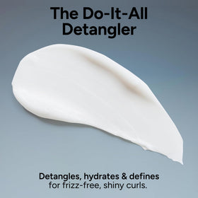 Ouidad applied to wet curls illustrating detangling and slip benefit