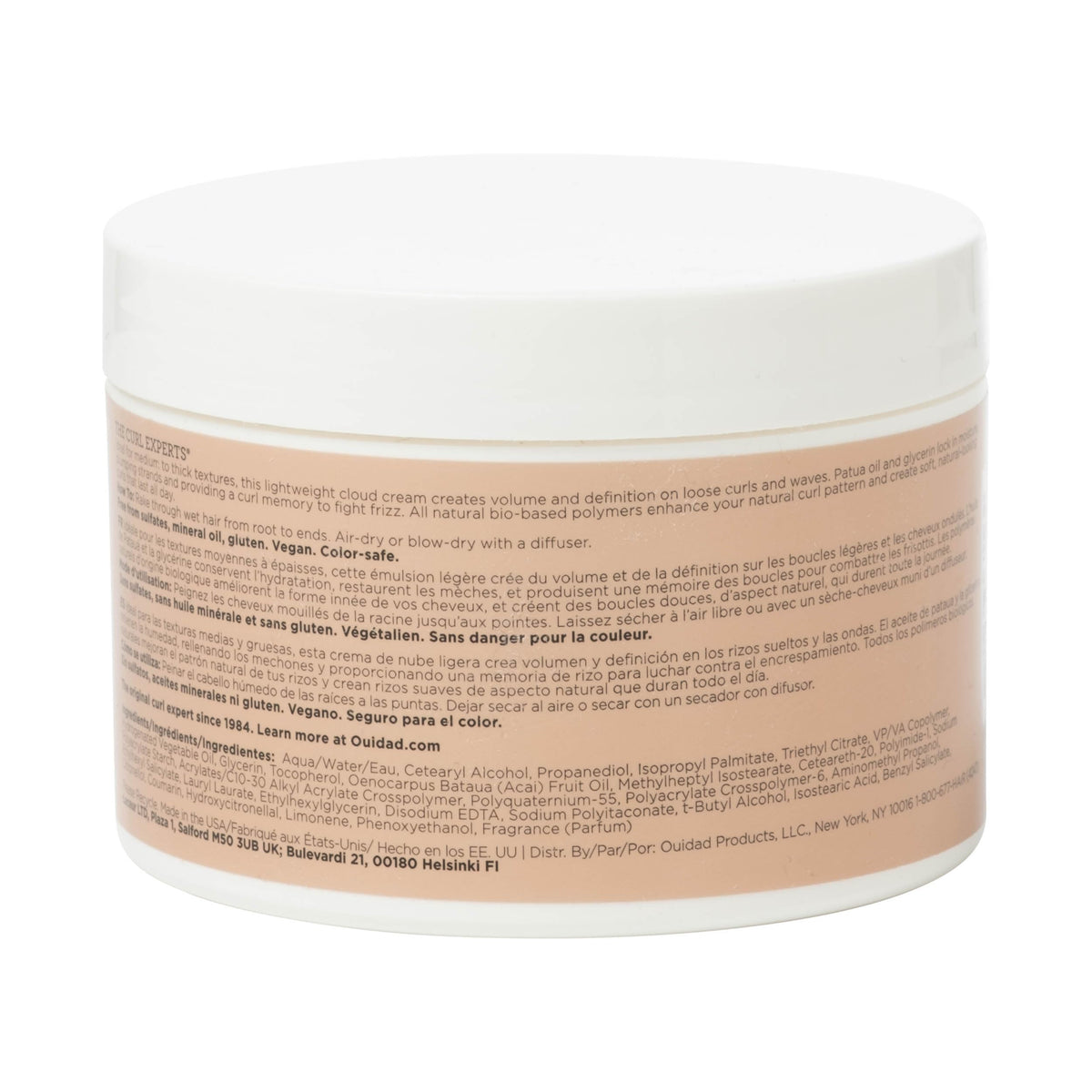 Ouidad product label close-up highlighting scent notes and styling benefits