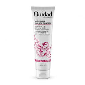 Ouidad jar front view showing product branding and travel size benefit