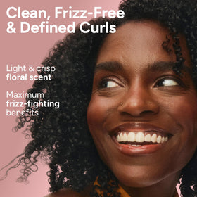 Ouidad in use wet curls shampooing to reduce frizz and improve manageability