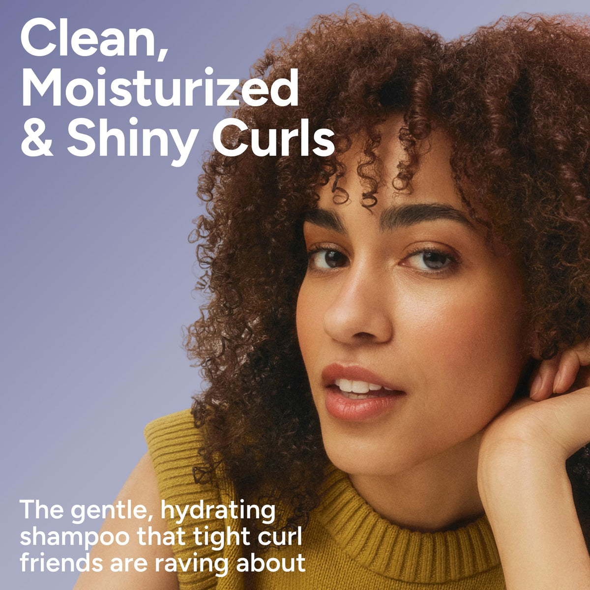 Ouidad shampoo pouring and lather closeup demonstrating gentle foam and cleansing