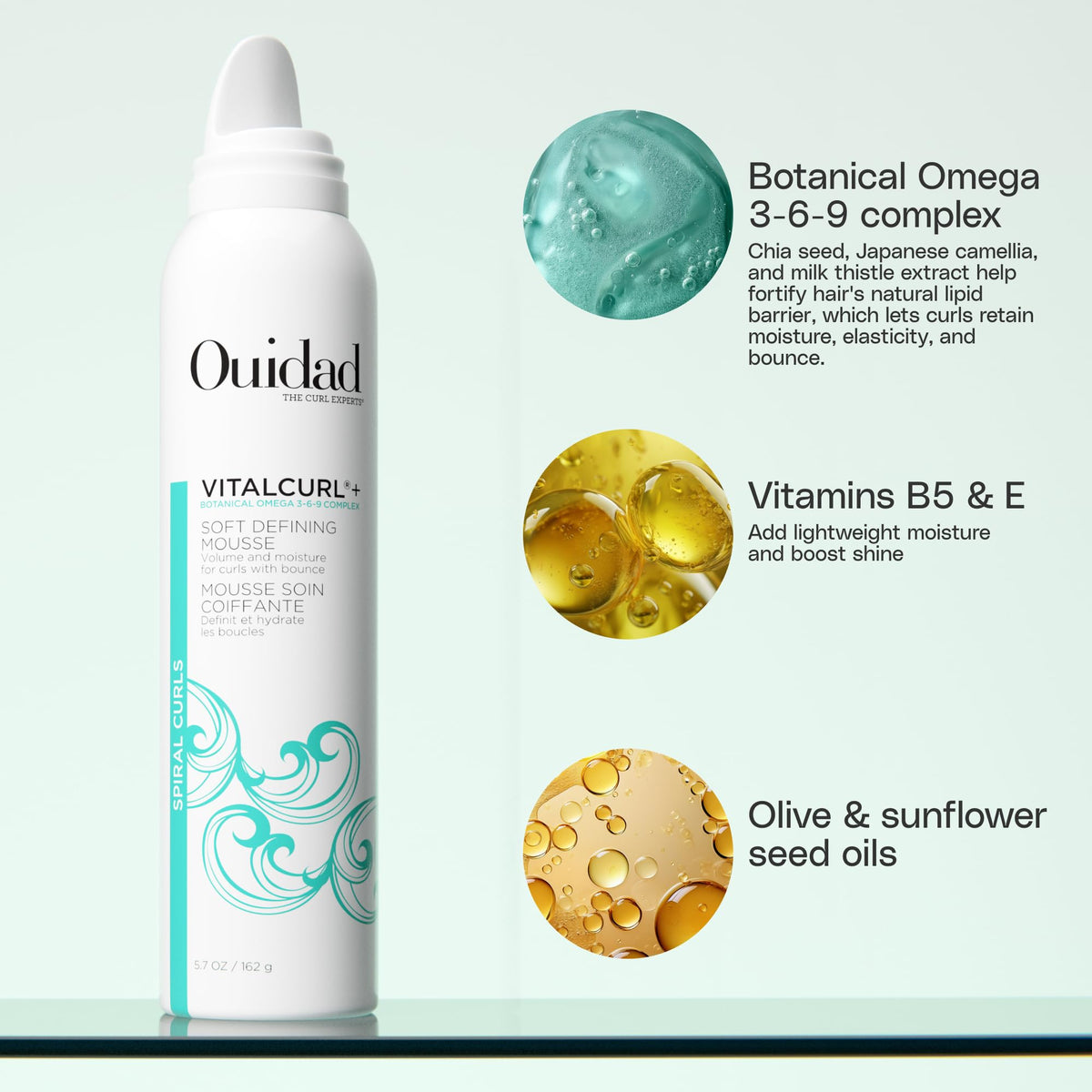 Close-up foam texture of Ouidad VitalCurl+ illustrating airy, weightless hold