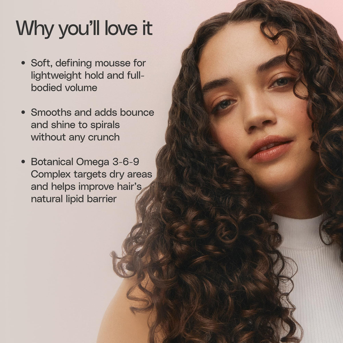 Ingredient label detail on Ouidad VitalCurl+ highlighting vitamins and botanical oils