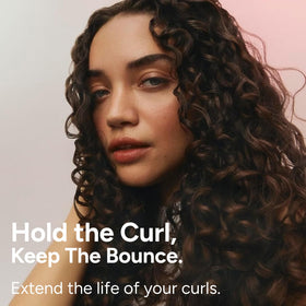 Before and after curls using Ouidad showing improved definition and bounce