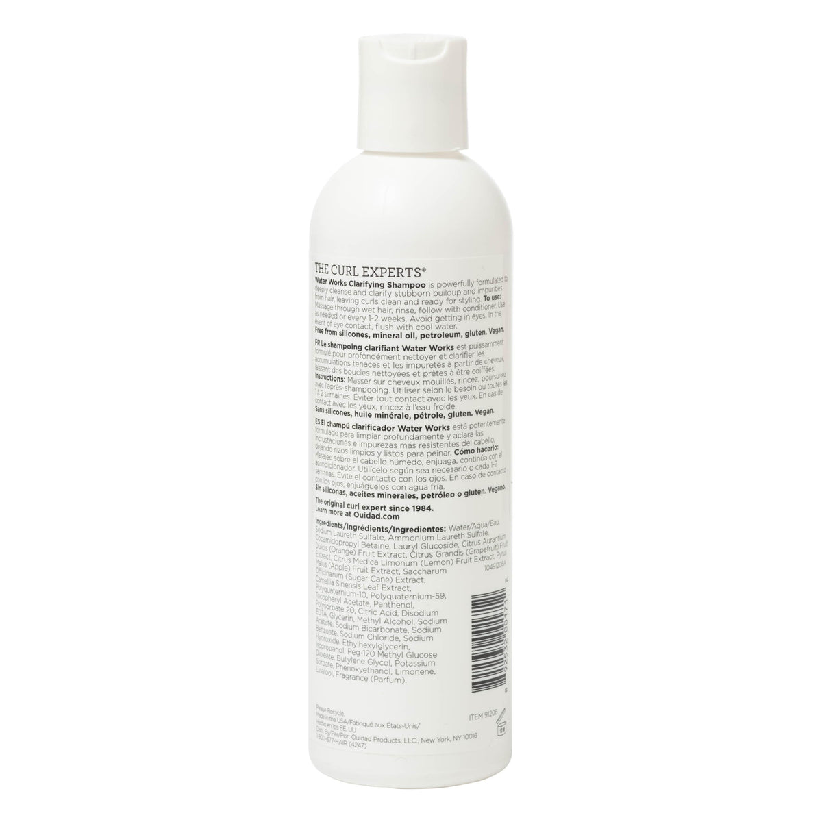 Ouidad Water Works shampoo lathering in curly hair for deep-clean benefits and softer curls