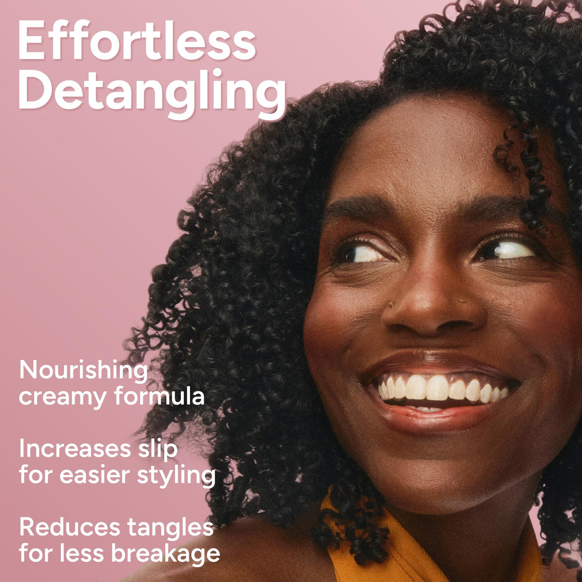 Ouidad used with a wide-tooth comb for even conditioner distribution