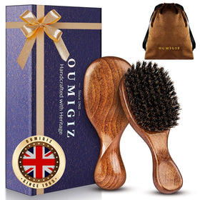 Oumigiz front view wooden hairbrush showing compact shape and elegant design for easy styling