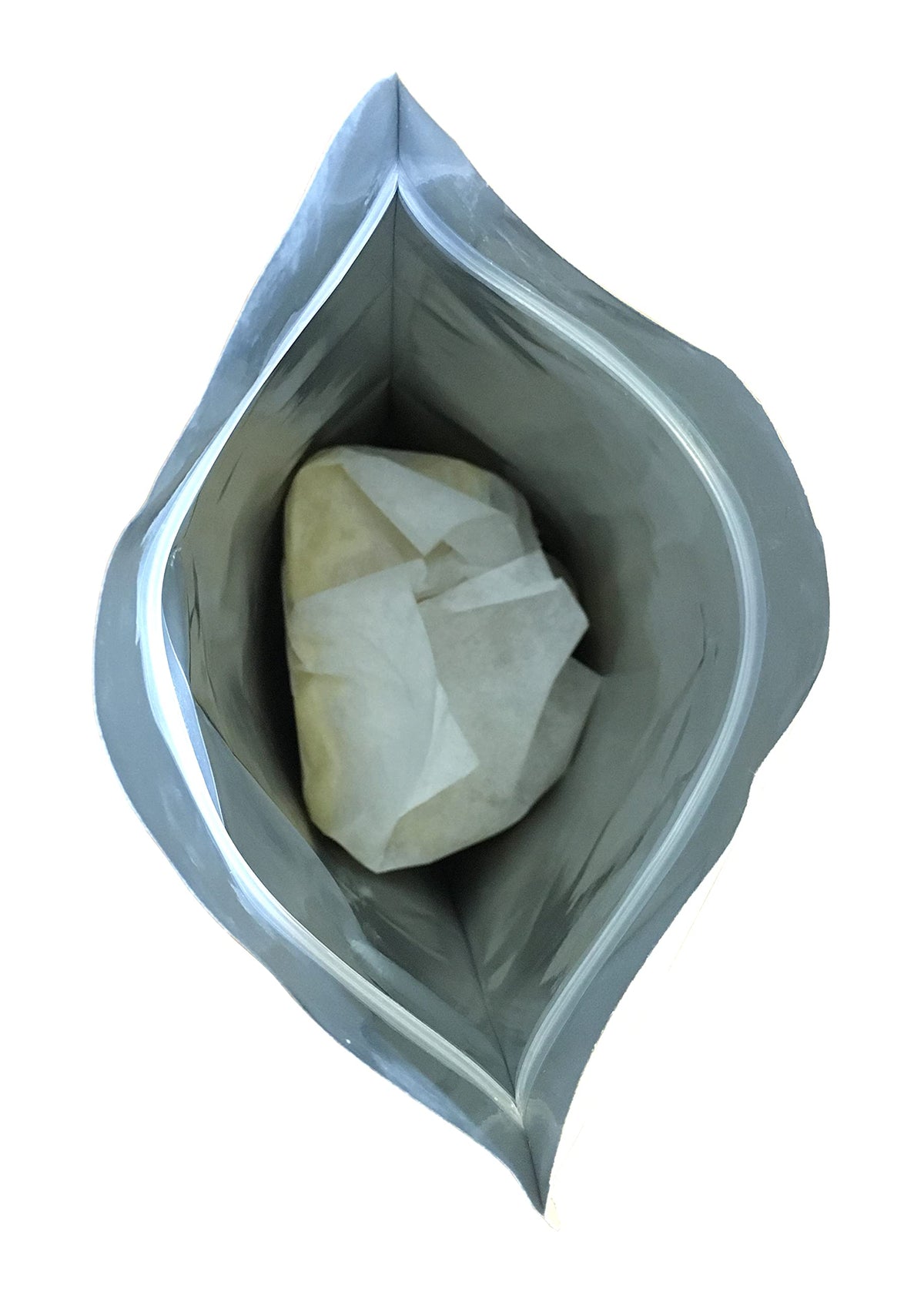 Our Earth's Secrets used in a mixing bowl with other ingredients for DIY products