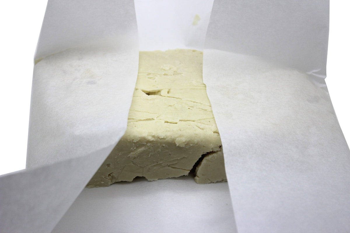 Our Earth's Secrets block beside ruler and 2 lb label showing scale and value