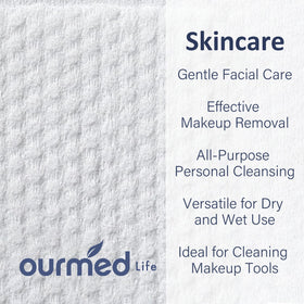 ourmed life folded towel held to show size and absorbency
