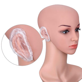 Outus ear cover on adult ear during hair dye application preventing stains