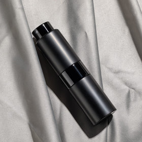 owlyee in purse lifestyle shot showing portable fragrance access for freshening on the go