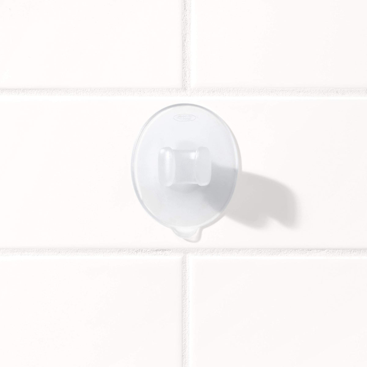 OXO holder with razor inserted showing secure, quick-access storage