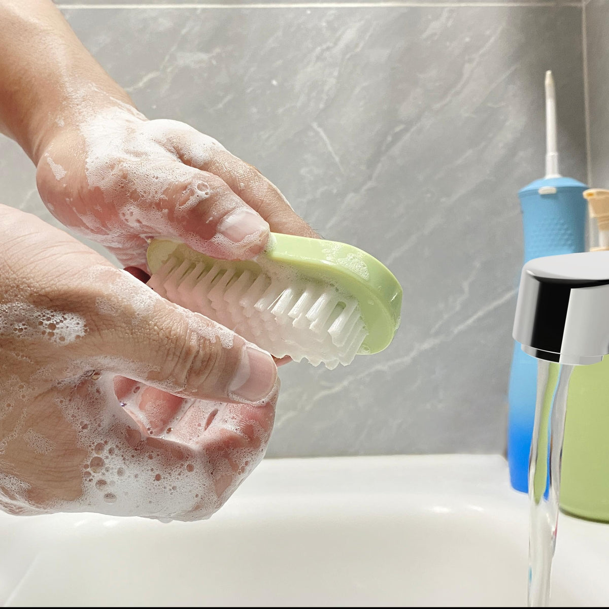 OYEWALLS nail brush used at kitchen sink to remove cooking residue and grease