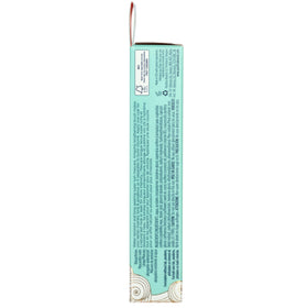 Pacifica Aquarian Gaze next to coin showing compact size and travel-ready water-resistant formula