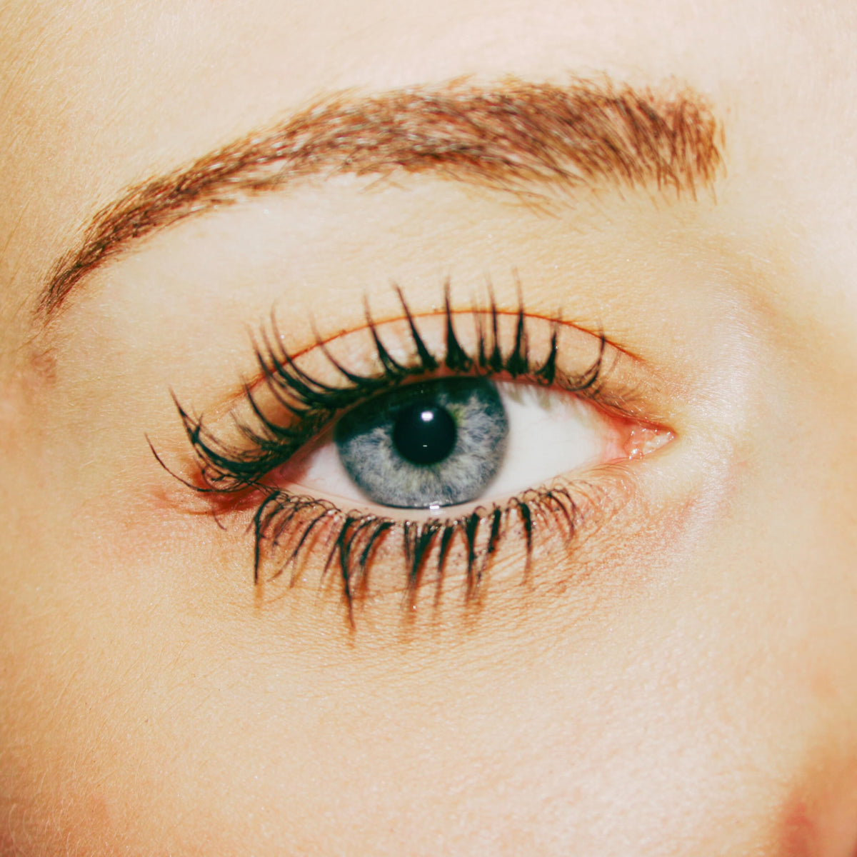 Pacifica Aquarian Gaze texture swiped on paper showing smooth formula for clump-free lengthening