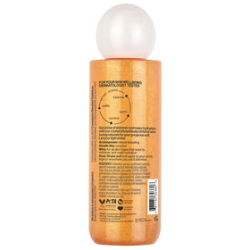 Pacifica bronzing body oil shimmer on skin macro revealing subtle bronze finish
