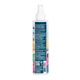 Pacifica fine spray nozzle close-up releasing mist for even, lightweight fragrance coverage