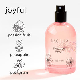 Pacifica perfume being sprayed on skin demonstrating quick mood-boosting use
