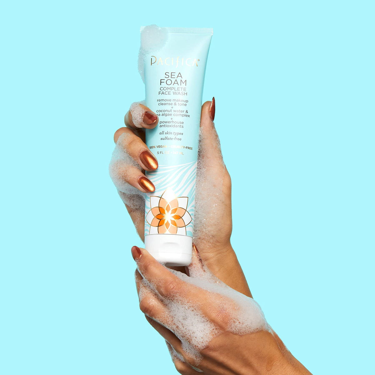 Pacifica Sea Foam held in hand for size comparison showing travel-friendly convenience