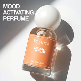 Pacifica Sugared Apricot mist spraying from nozzle for quick, even application