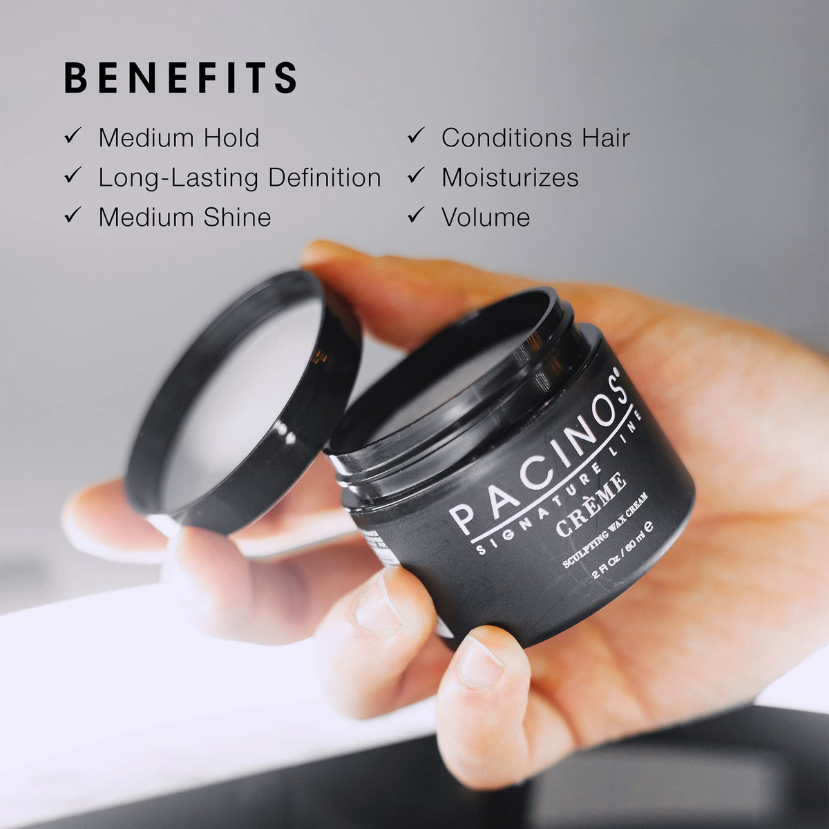Pacinos open jar revealing creamy wax texture for easy styling
