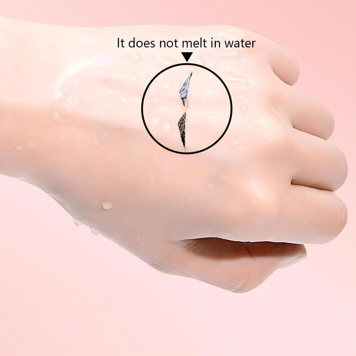 PAGE VINE pen next to hand to show compact size and travel-friendly design
