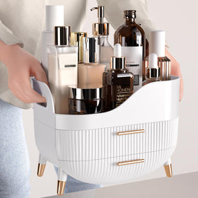 Pajiriona next to a hand and products showing compact size and capacity
