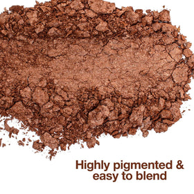 Palladio close-up of baked bronzer pan highlighting shimmering pigments and blendability