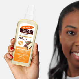 Palmer's application to scalp demonstrating gentle massage for nourishment