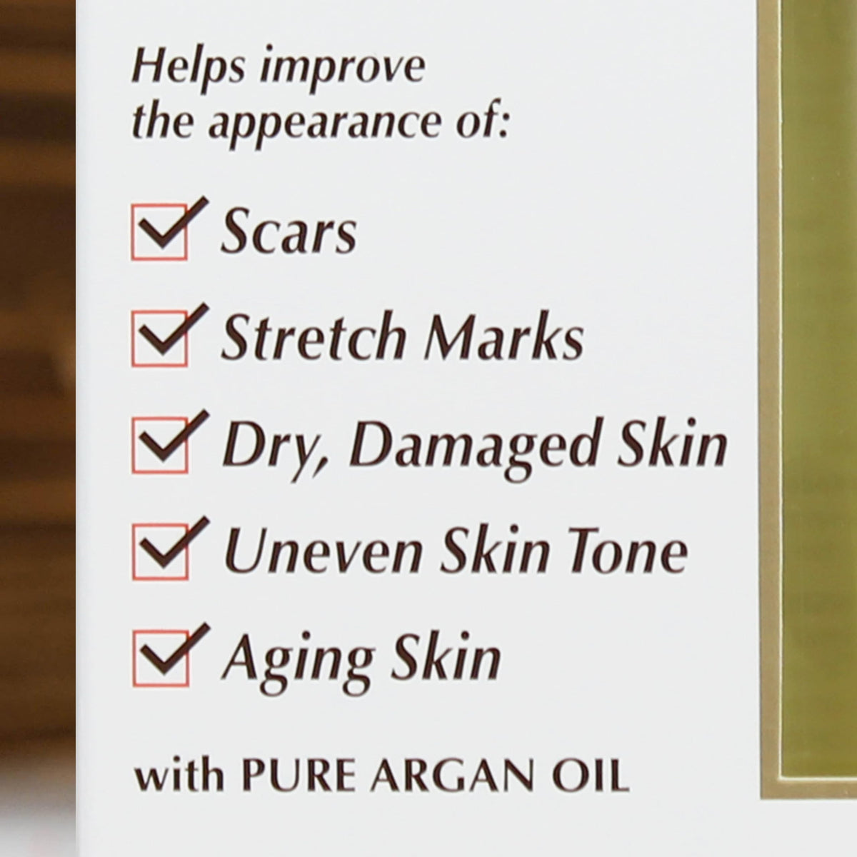 Palmer's cocoa body oil next to pure argan oil bottle emphasizing conditioning benefits