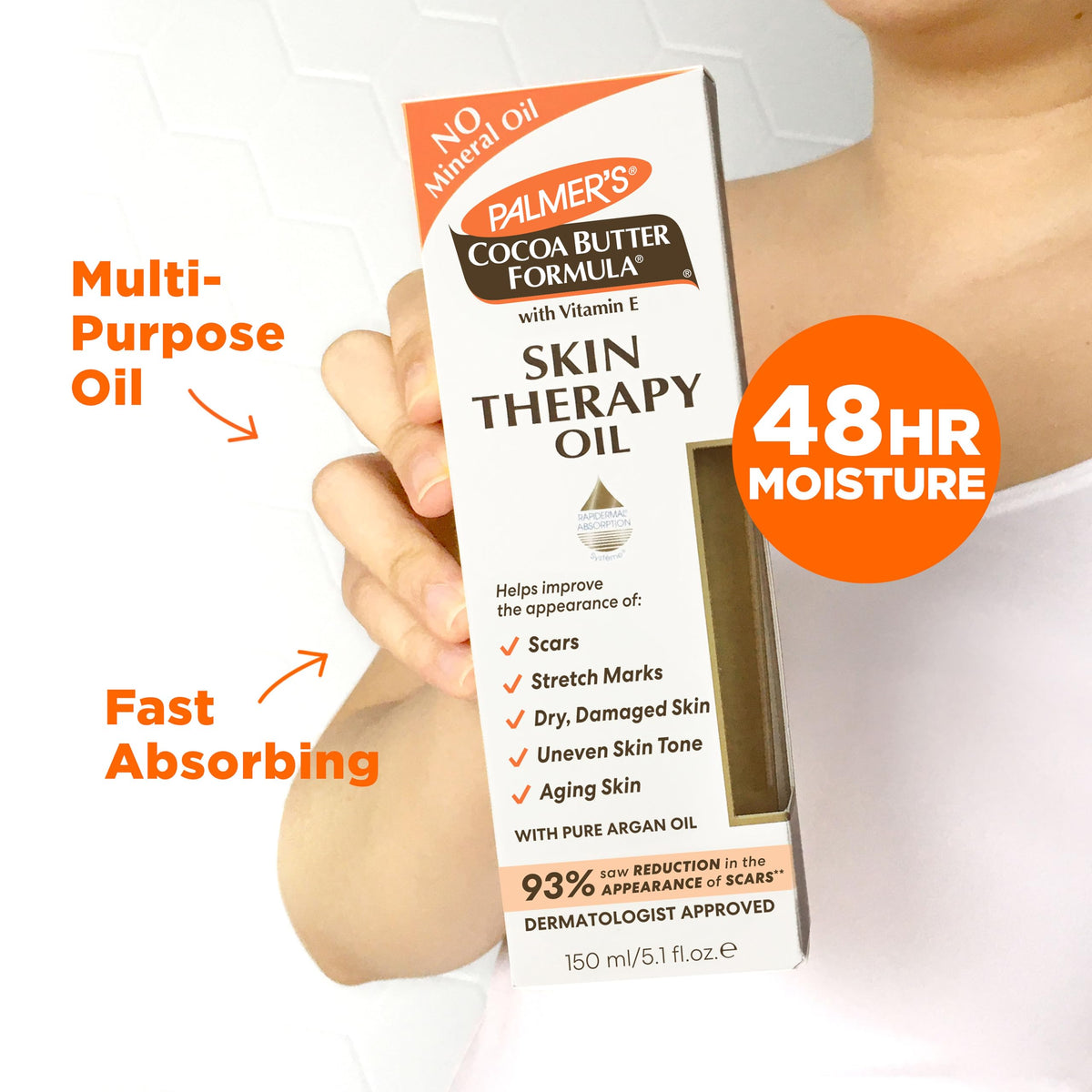 Close-up texture of Palmer's cocoa body oil showing silky finish and quick absorption