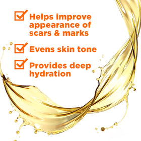 Palmer's oil being dispensed from dropper highlighting easy dosing and non-greasy feel