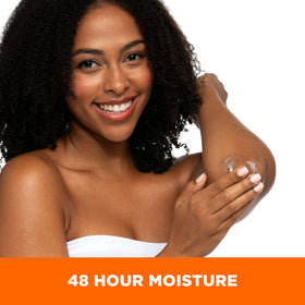 Palmer's applying balm to hand to show concentrated hydration for dry skin