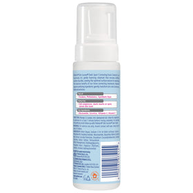 Close-up of Palmer's Eventone foamy texture on fingertips illustrating gentle effective cleanse