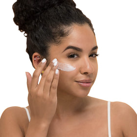 Palmer's night cream next to a ruler to show 2.7 ounce size for accurate scale