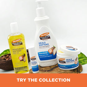 Palmer's stick beside hand for scale showing small size and easy portability benefit