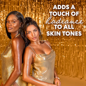 Palmer's oil on décolletage catching light for enhanced tan and luminous effect