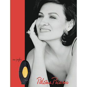 Paloma Picasso cap and bottle profile close-up highlighting designer detail
